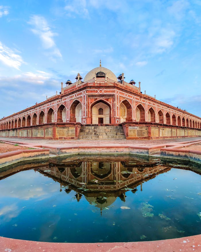 gallery-4 Architectural marvel of Humayun's Tomb reflecting in water, New Delhi, India.