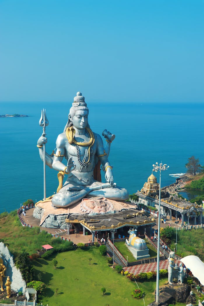 gallery-5 A majestic statue of Lord Shiva by the sea at Murudeshwar, India.
