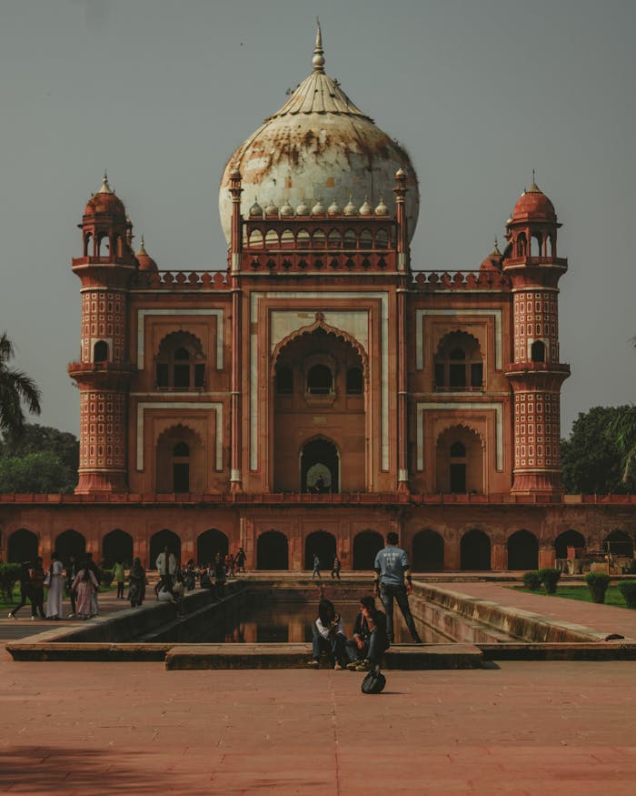 hero-img-01 Scenic view of Safdarjung Tomb, a Mughal architectural masterpiece, with people exploring, in New Delhi, India.